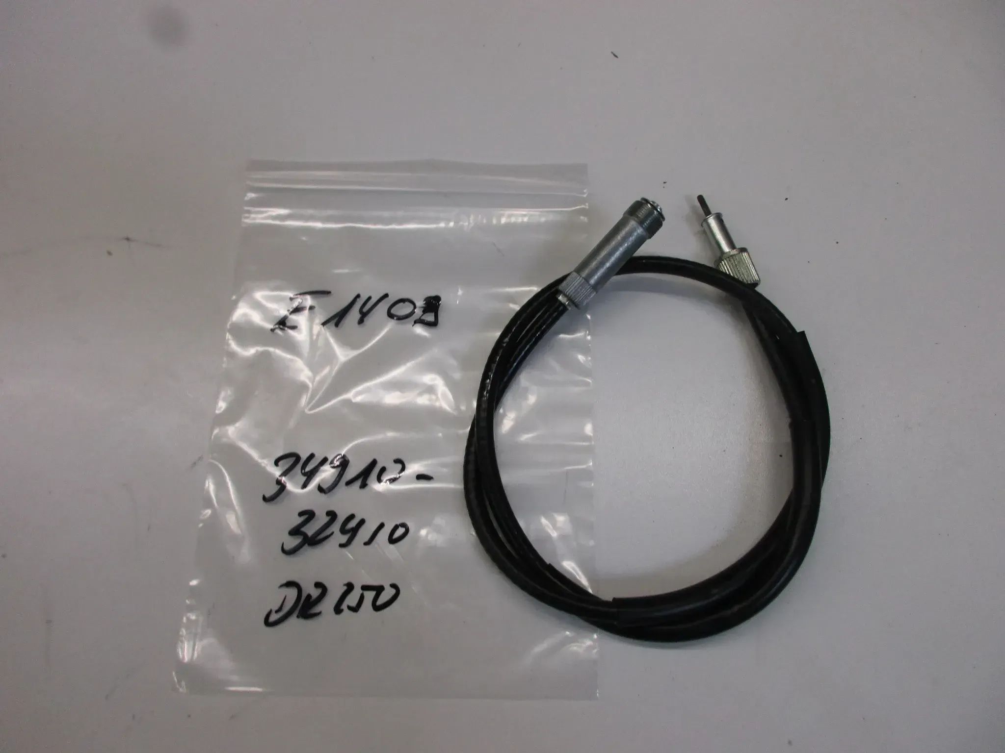 E1409 Suzuki DR 250 S Tachowelle Tachometerwelle 34910-32410 Tacho Welle speedo - Bild 1