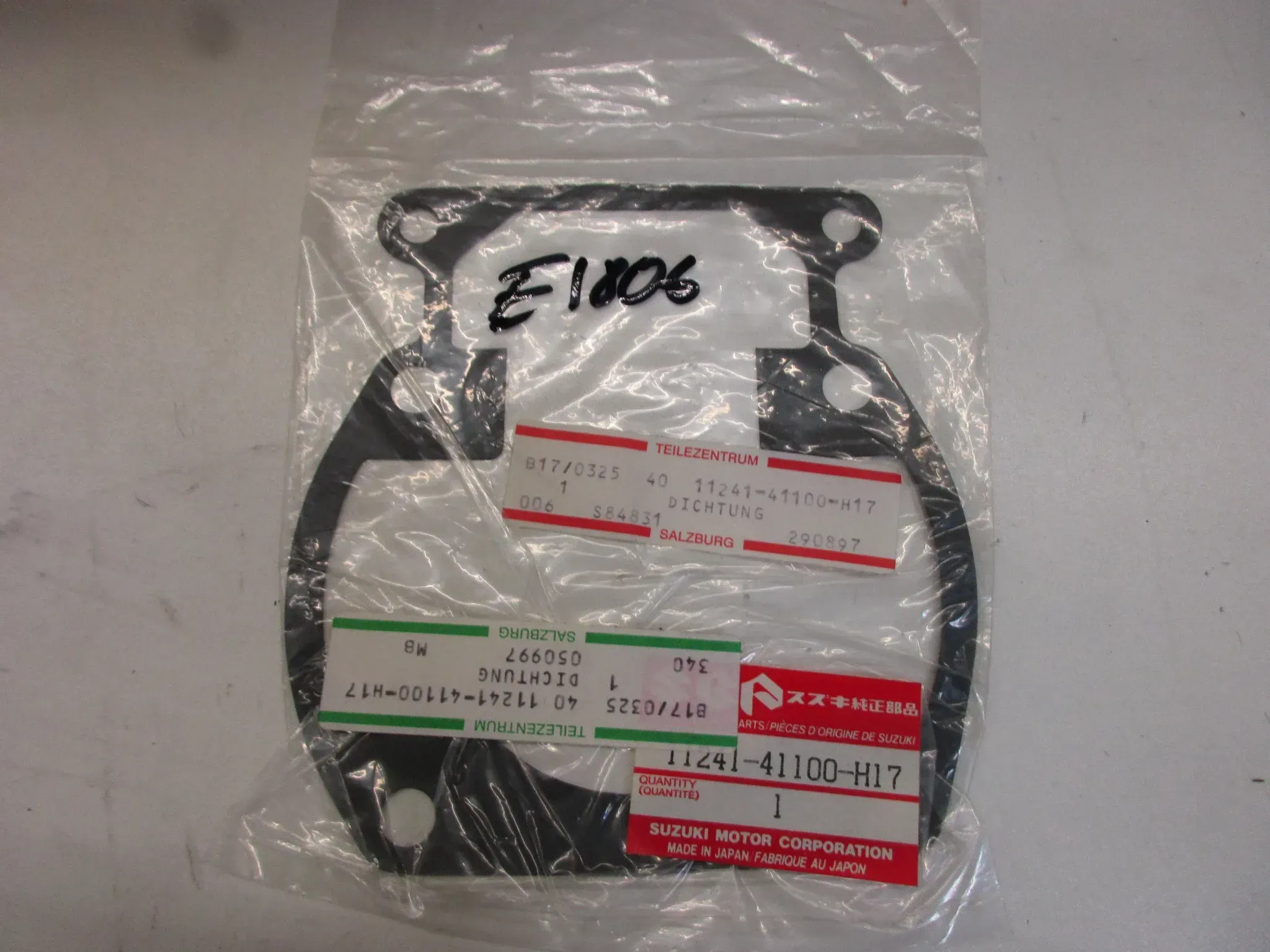 E1806. Suzuki TS 250 ER Dichtung Zylinderfußdichtung 11241-41100-H17 Motordichtung - Bild 1
