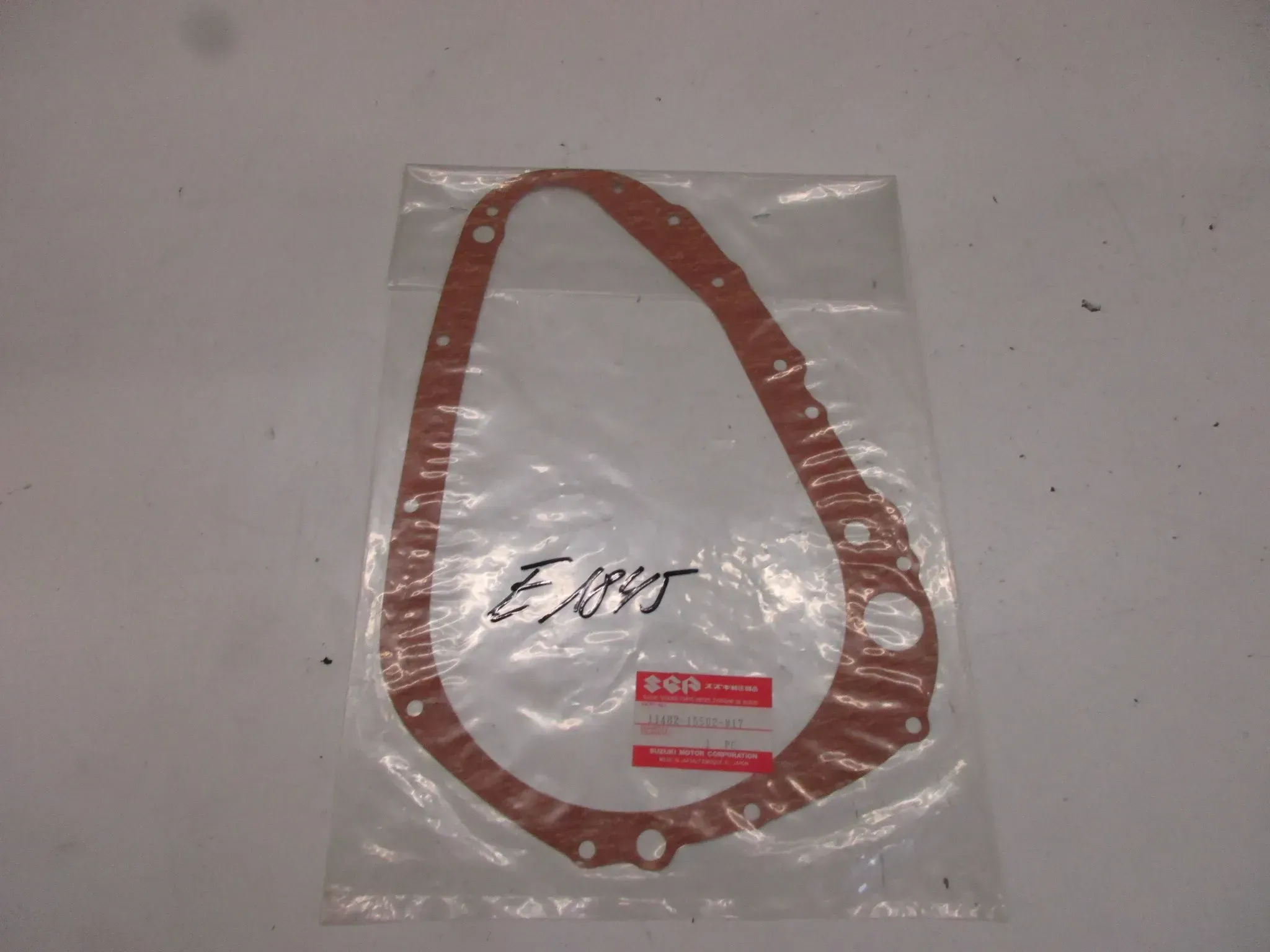 E1845. Suzuki GR 650 X Tempter Dichtung 11482-15502-H17 Kupplungsdeckel Motordeckel - Bild 1