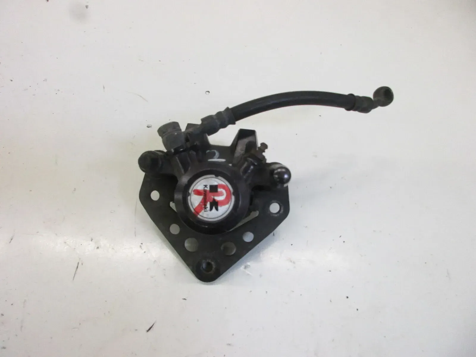 Kawasaki GPZ 750 UT ZX 750 A Bremssattel (2) vorne rechts Bremszange Bremskolben - Bild 1