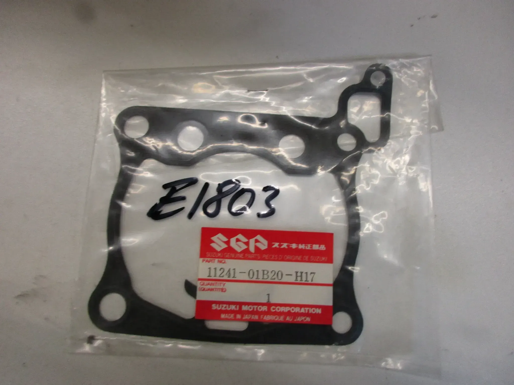E1803. Suzuki RM 125 86-88 Dichtung Zylinderfußdichtung 11241-01B20-H17 Motordichtung - Bild 1