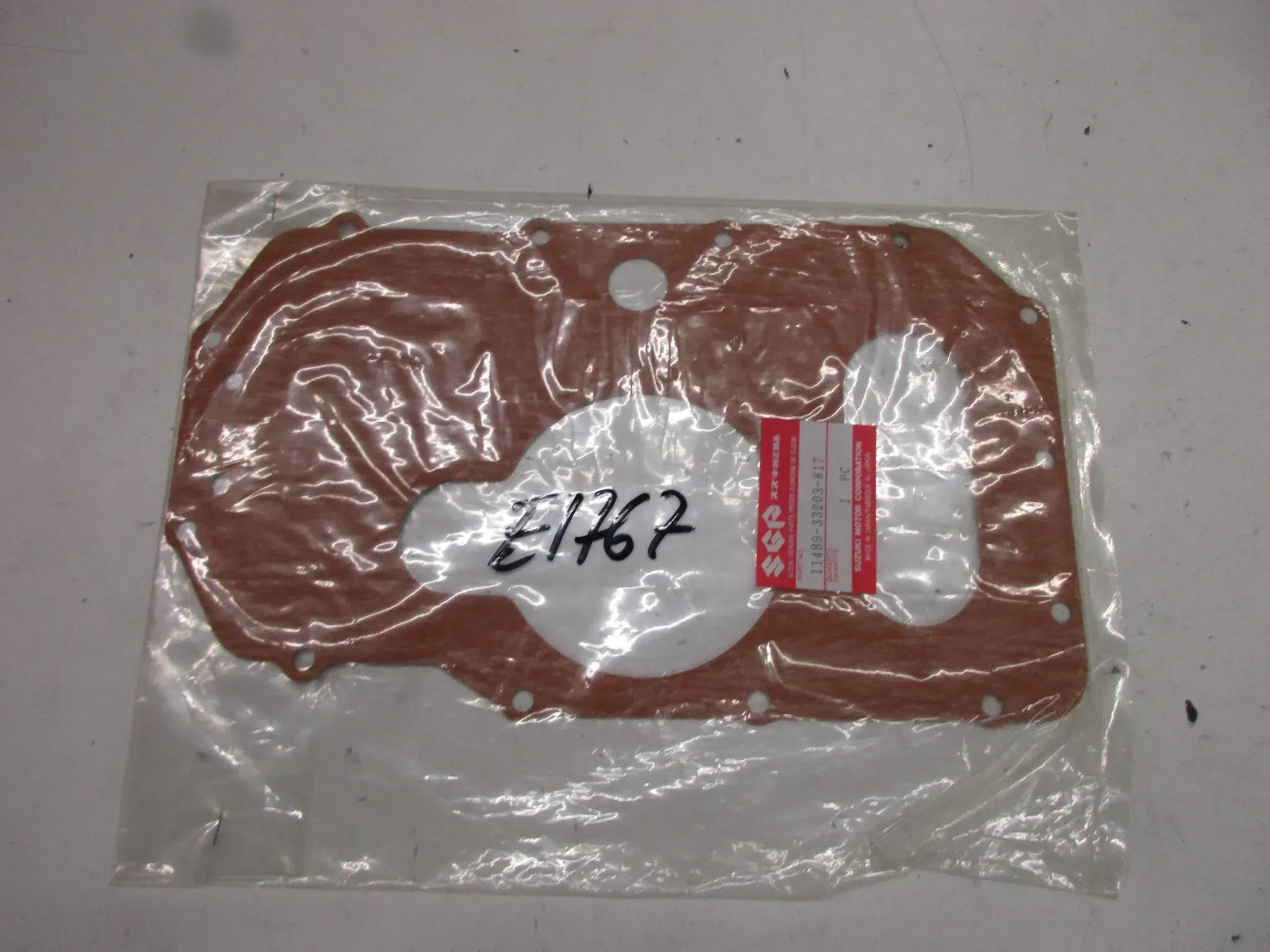 E1767. Suzuki GSX 400 E Dichtung Motordichtung 11489-33203-H17 Ventildeckel Motor - Bild 1