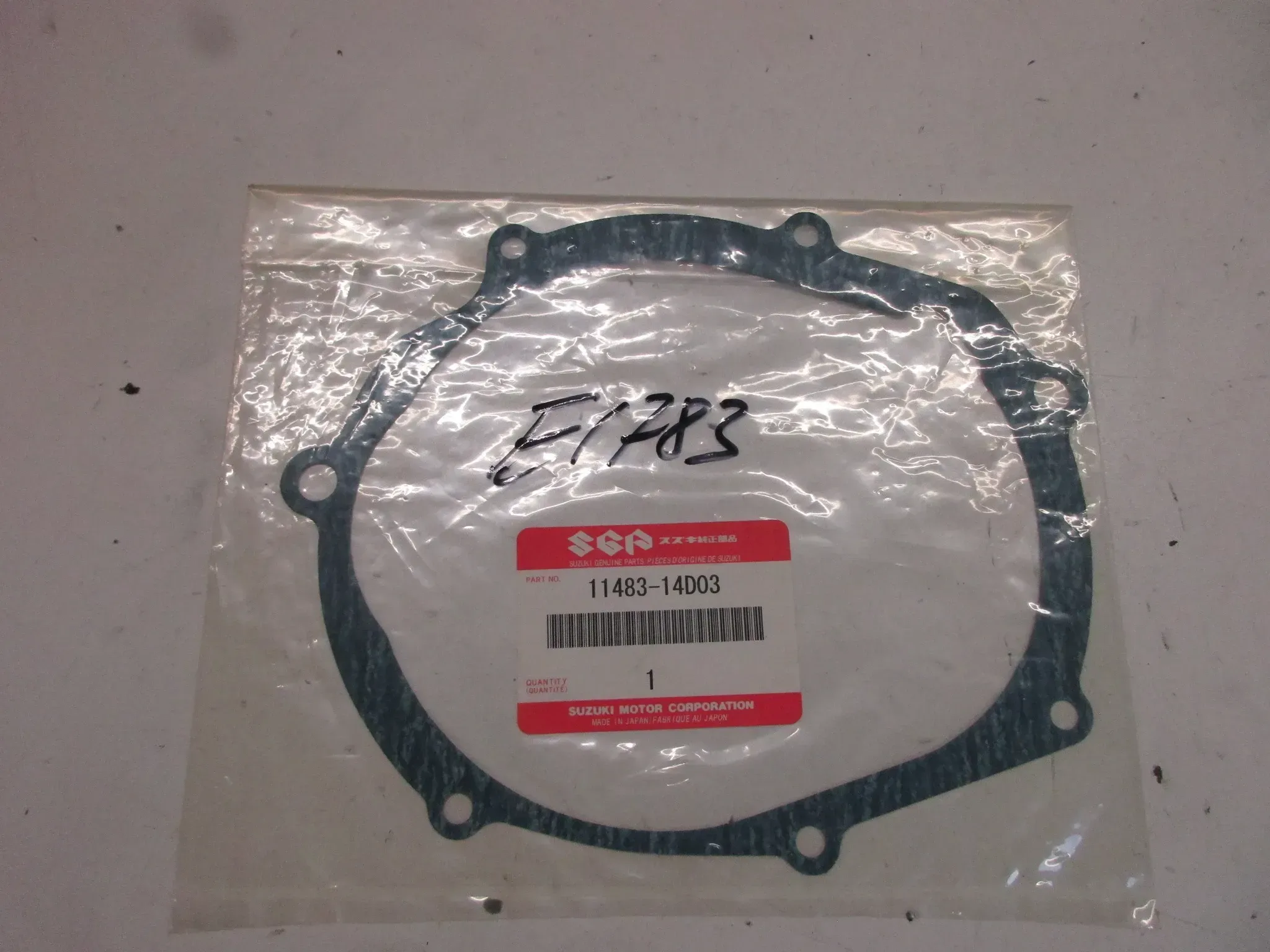 E1783. Suzuki DR 250_350 Dichtung Motordichtung 11483-14D03 Lichtmaschine Polrad - Bild 1