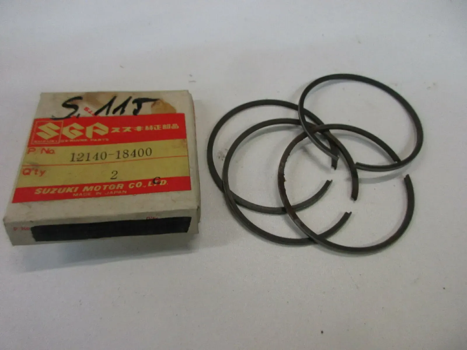 S115 Kolbenringe Suzuki T 250 Original Kolben piston 12140-18400 - Bild 1