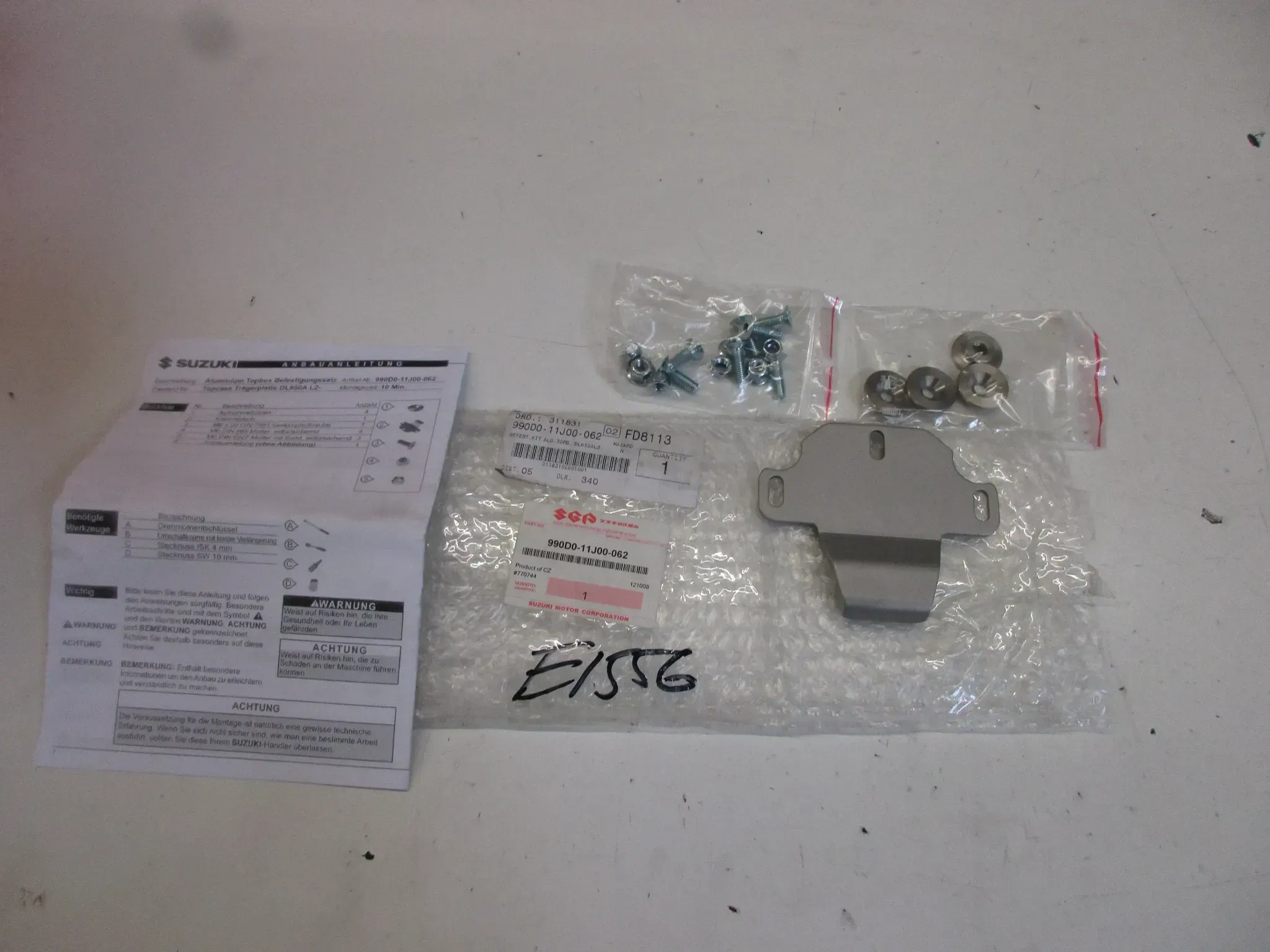 E1556. Suzuki DL 650 A Halter 990D0-11J00-062 Montagekit Topcase Aufnahme Rahmen - Bild 1