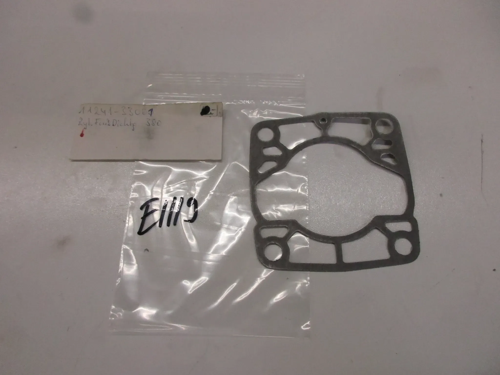 E1119 Suzuki GT 380 Dichtung Zylinder 11241-33001 Motordichtung Zylinderfußdichtung - Bild 1