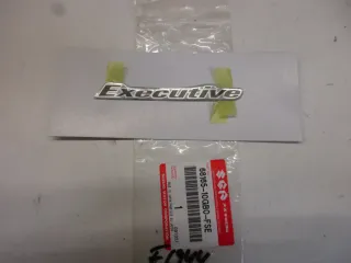 E1944. Suzuki AN 650 A Burgman Aufkleber Schriftzug 68165-10GB0-FSE Dekor Verkleidung Emblem Logo - Bild 1