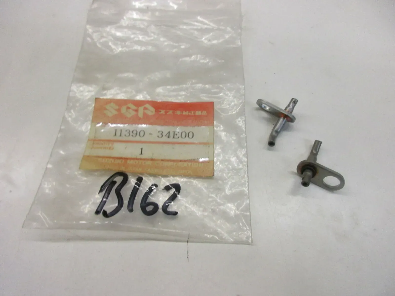 B162. Suzuki GSX 1300 R  GSX-R 750 Düse rechts Kolben Motor Zylinder 11390-34E10 - Bild 1