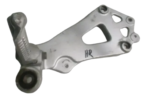 Background image for Suzuki GSX-R 750 GR 75 A Knicker Fußrastenhalter hinten rechts Fußraste