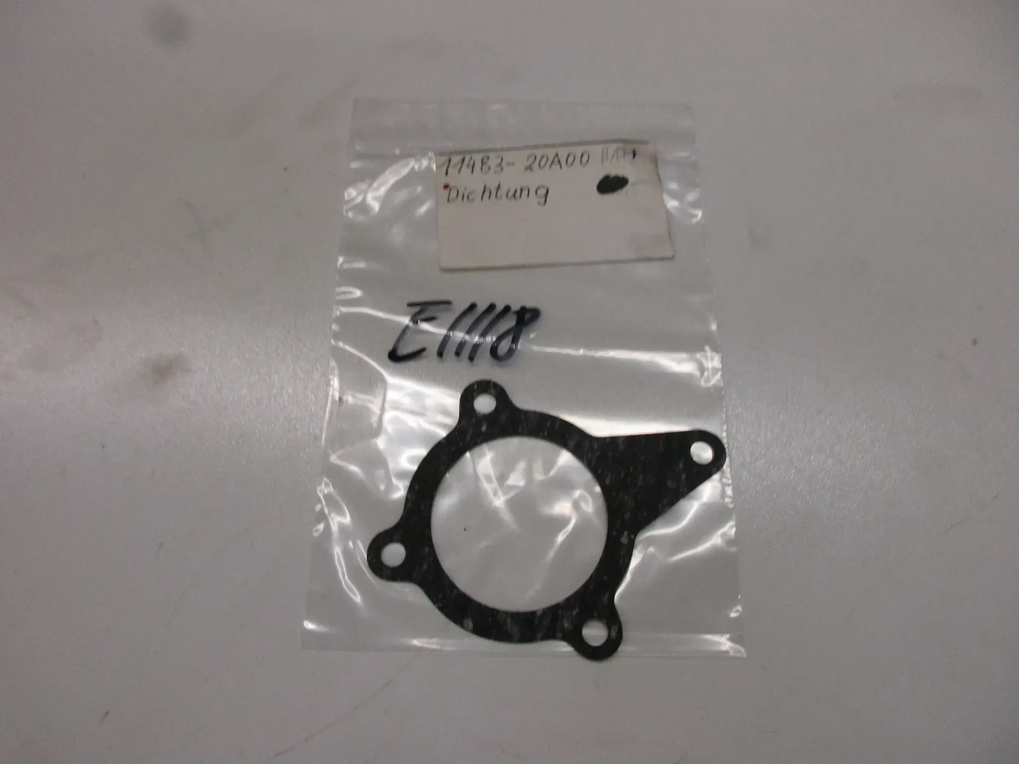 E1118 Suzuki RG 500 Gamma Dichtung Vergaser Zylinder 11483-20A00 Motordichtung - Bild 1