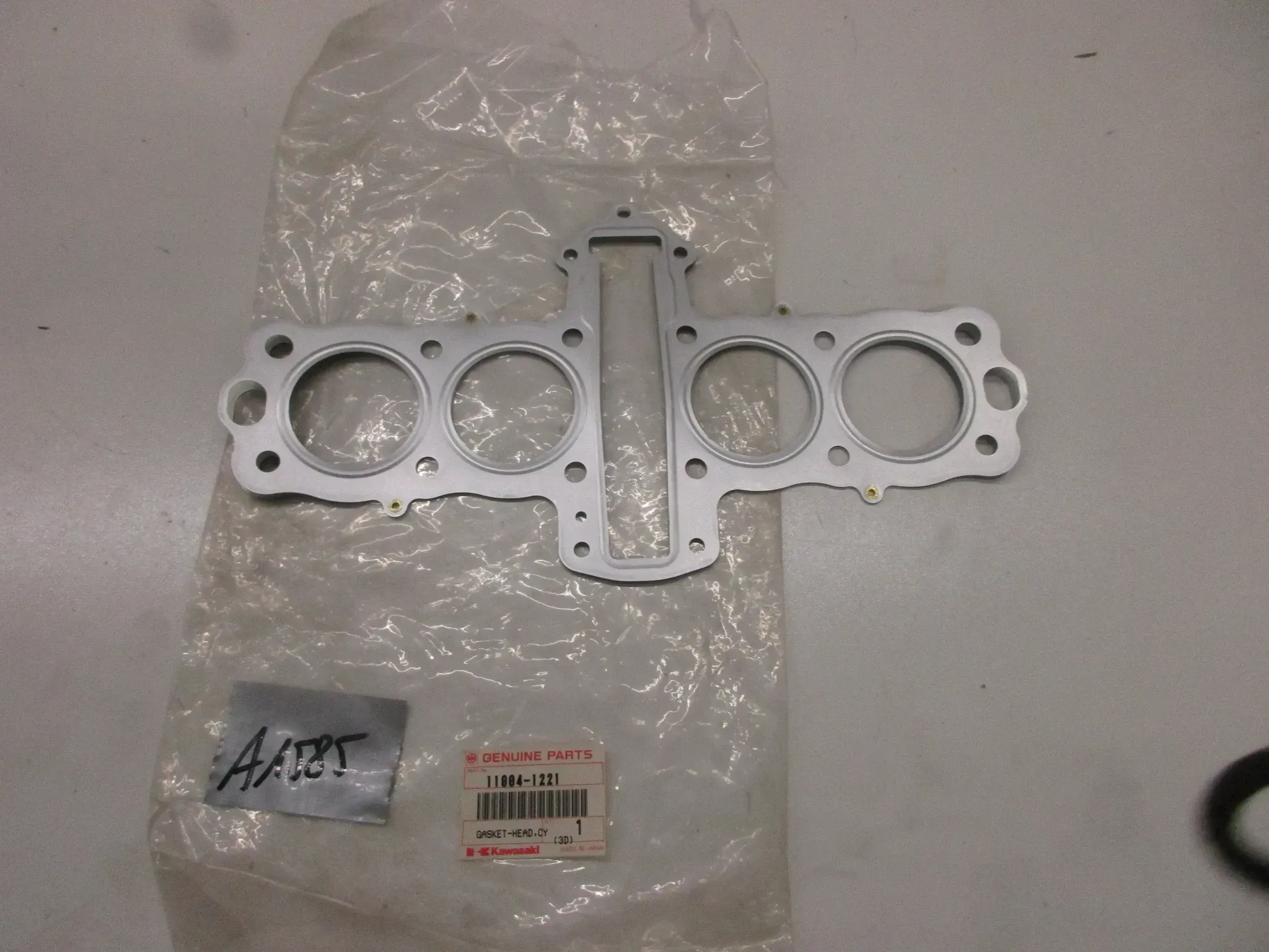 A1585 Kawasaki Z 400 FII ZX 400 Zylinderfußdichtung Motor 11004-1221 Original gasket - Bild 1