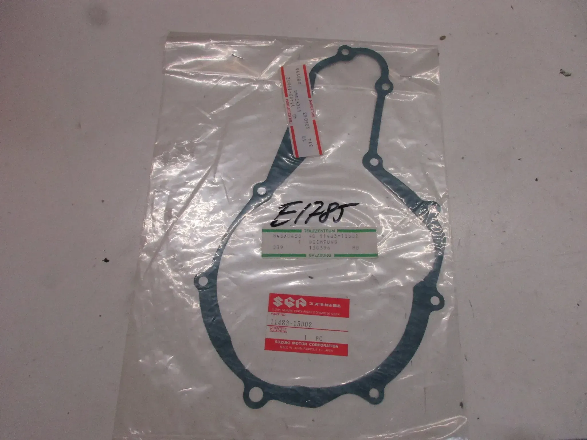 E1785. Suzuki DR 350 Dichtung Motordichtung 11483-15D02 Lichtmaschinendeckel - Bild 1