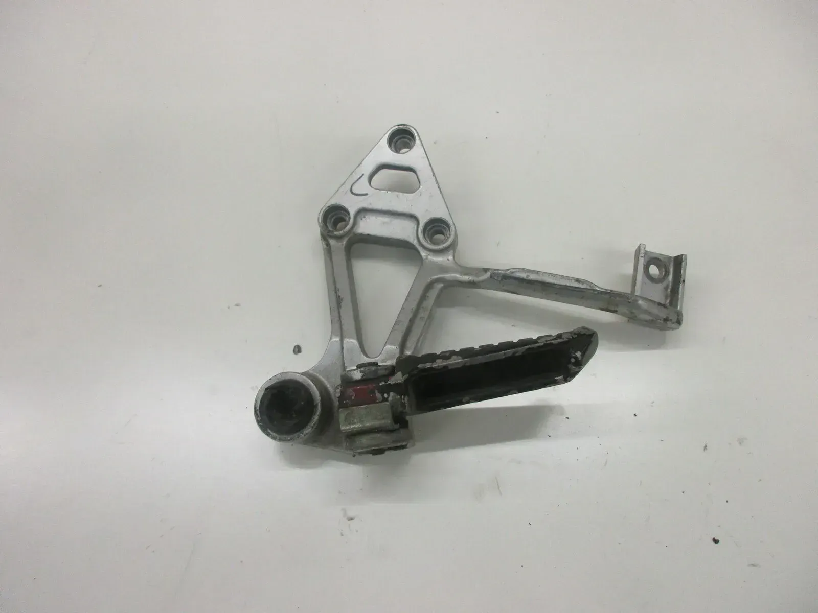1. Kawasaki GPX 600 R ZX600A Fußraste hinten links Soziusraste Fussrastenhalter - Bild 1