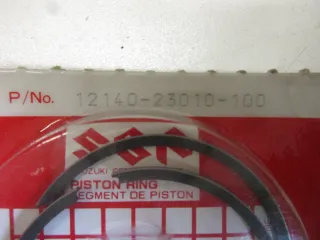 E1042. Suzuki A 100 Kolbenringe Kolben 12140-23010-100 Original Übergröße 1.0 - Bild 3