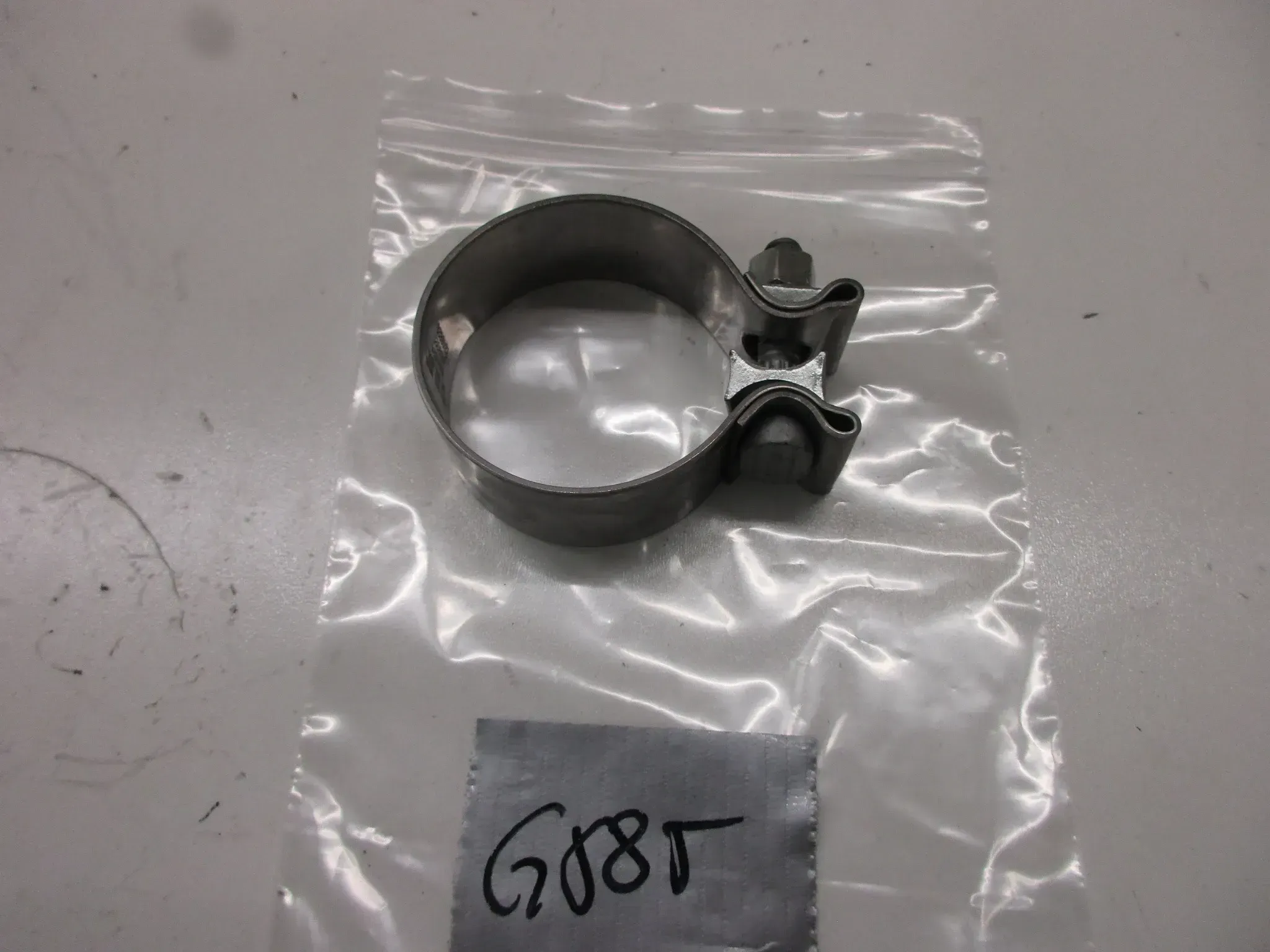 G585 Harley Davidson Auspuffschelle Endtopf Krümmerschelle 63,5 mm Flansch - Bild 1