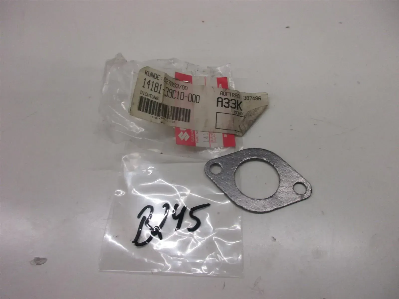 B245. Suzuki AP 50 AH 50 AY 50 Dichtung Asupuffdichtung Krümmer seal 14181-39C10 - Bild 1