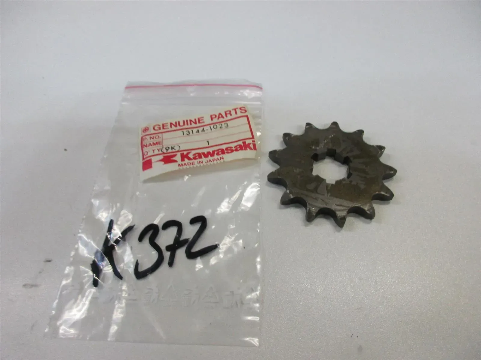 K372 Kawasaki KX 60_65_80_100 Zahnrad Ritzel T 13 Motor Getriebe 13144-1023 - Bild 1
