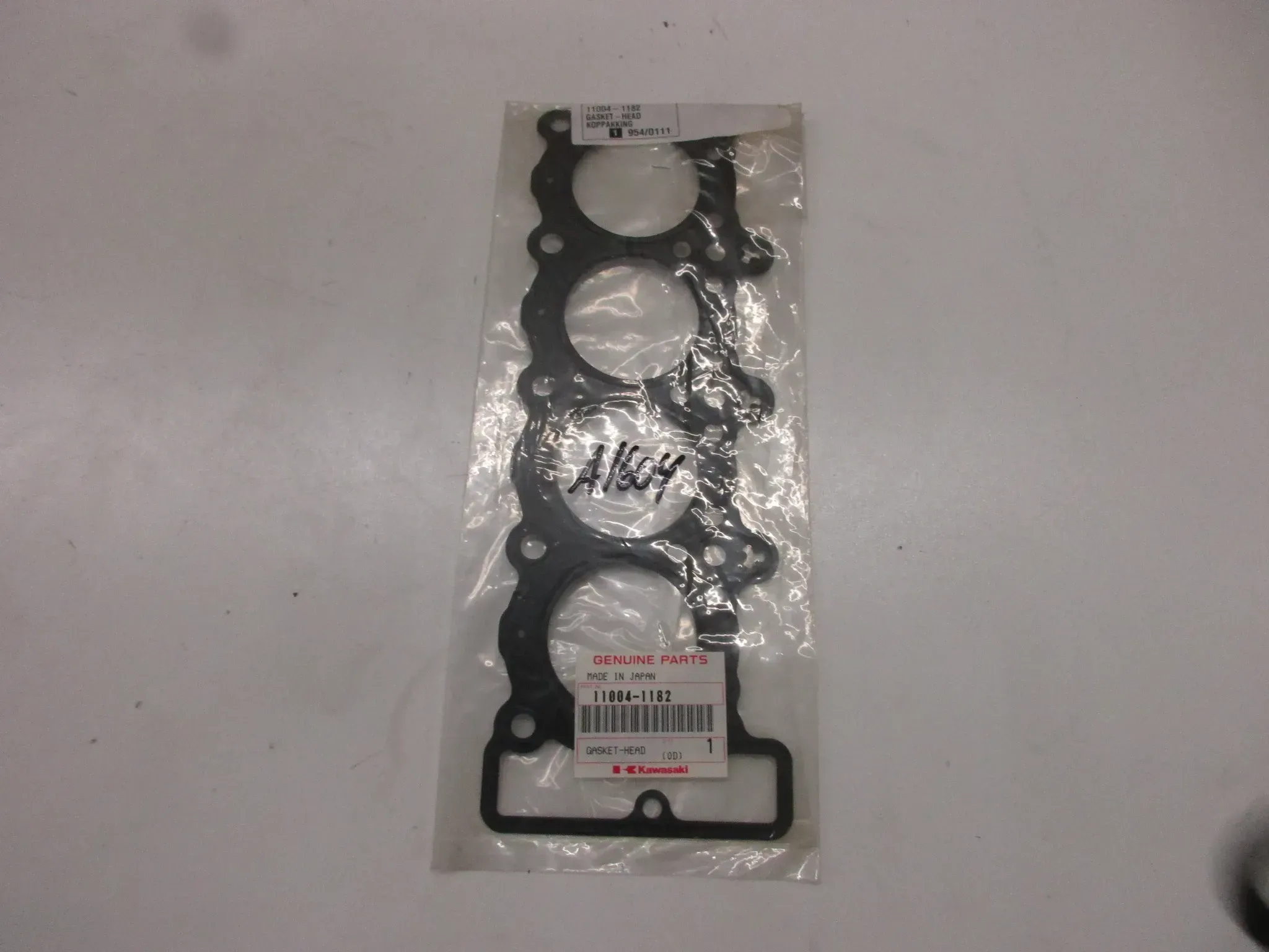 A1604 Kawasaki ZXR 400 H Zylinderfußdichtung Motor 11004-1182 Original gasket - Bild 1